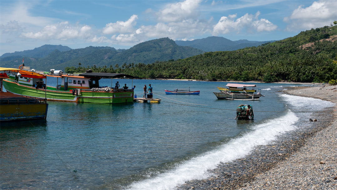 Dive site in Bolsel with fishing boats